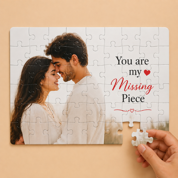 Personalized couple photo puzzle with missing piece held by hand and romantic quote on beige background.