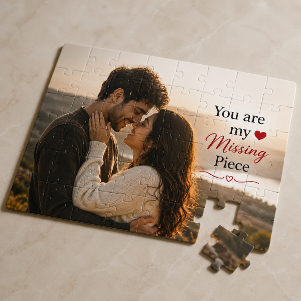 Custom couple photo puzzle with romantic quote and missing puzzle piece displayed on a soft marble background.